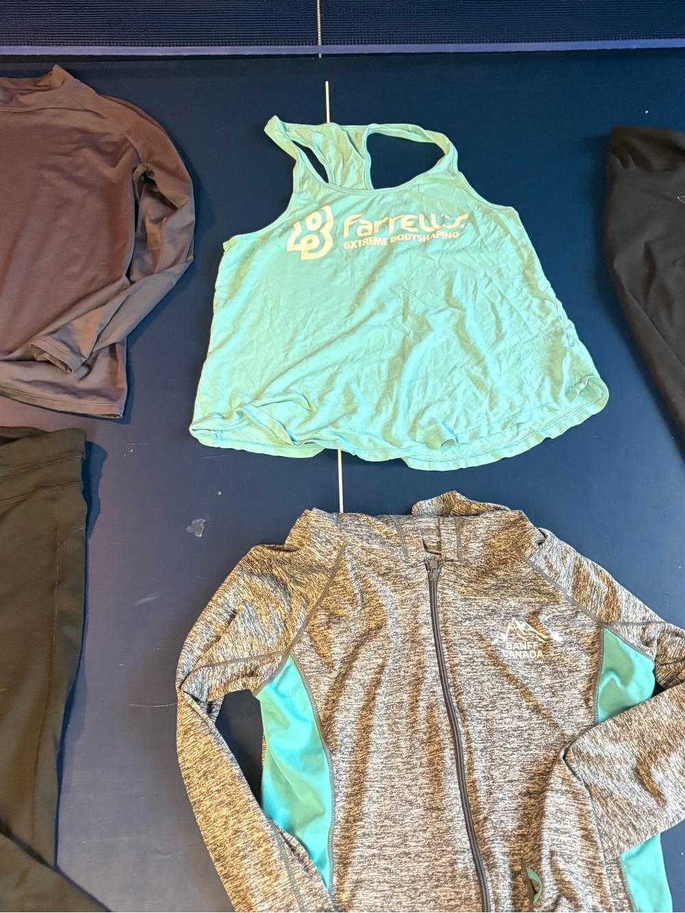 6 women’s size small fitness tops and bottoms